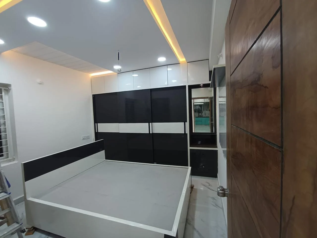Bedroom · Dark & light finishes in a Space Crafts client home