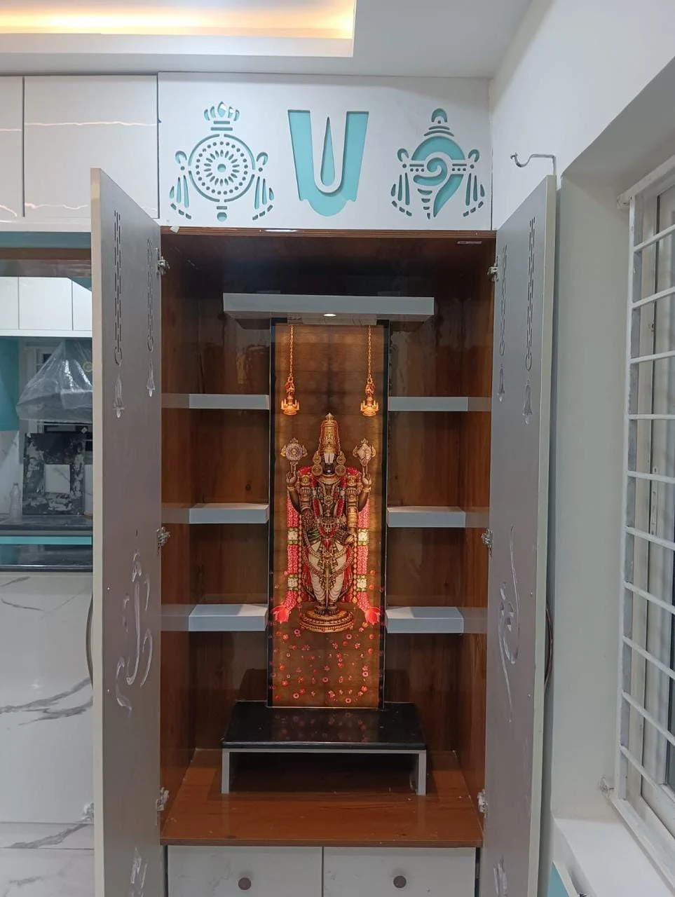 Pooja unit · Custom detailing in a Space Crafts client home