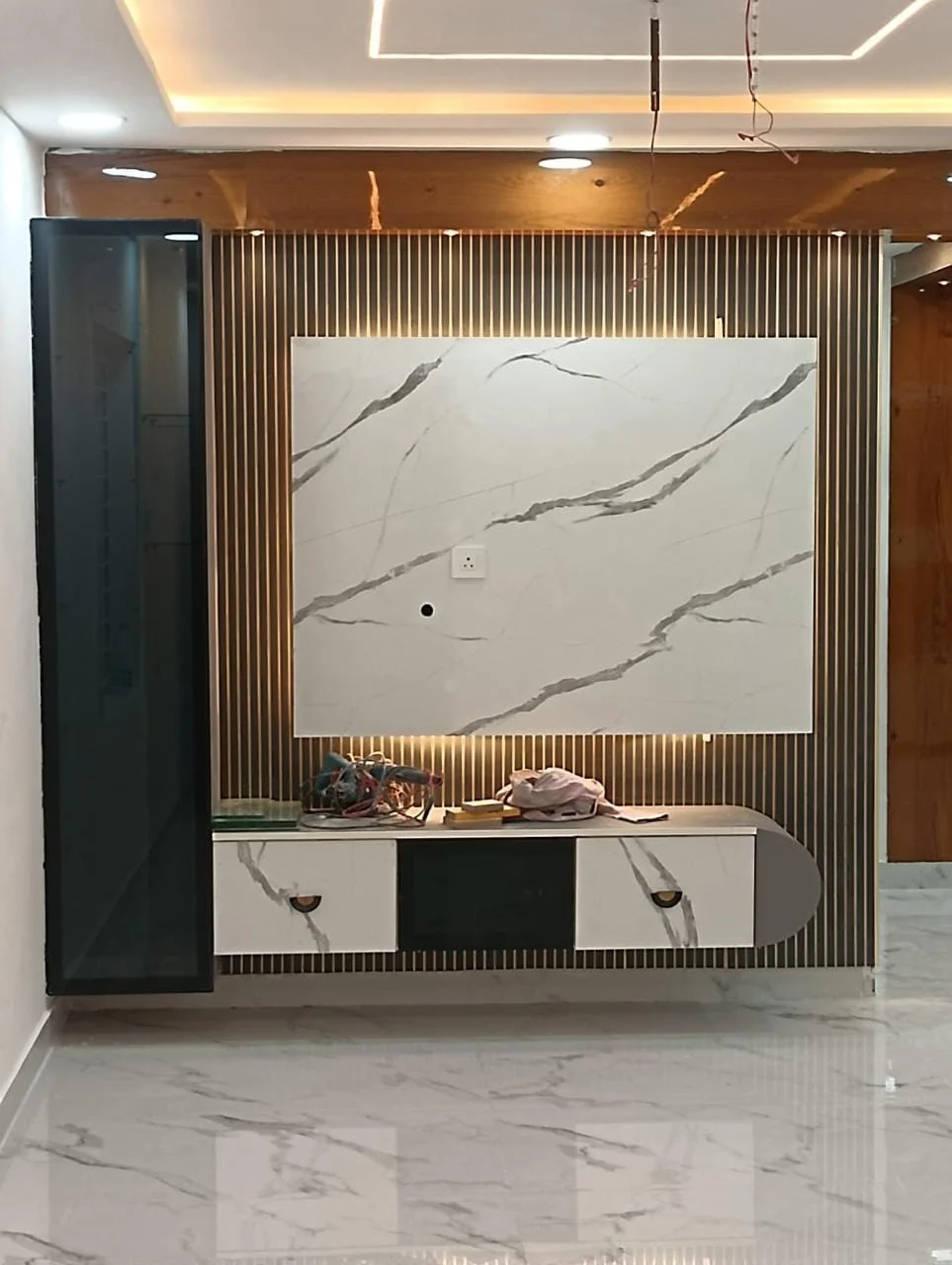 TV unit · Wood & marble finishes in a Space Crafts client home